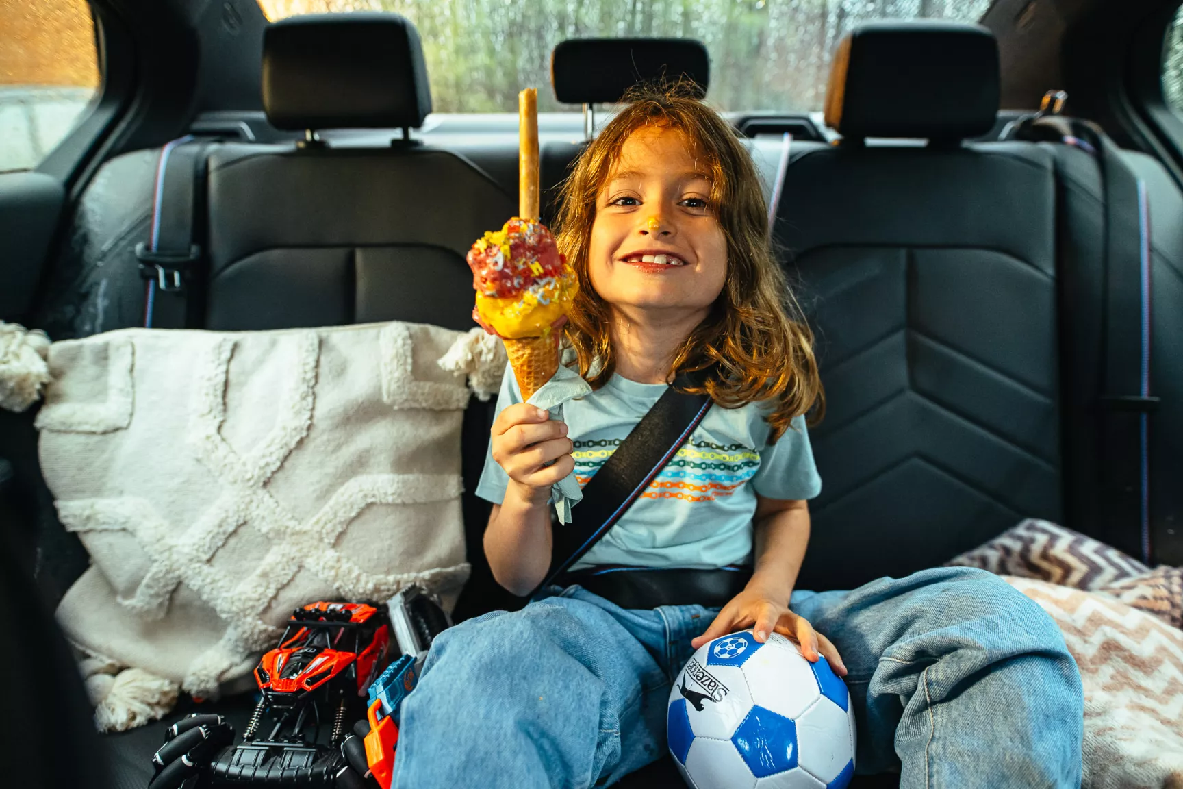 kid in car backseat